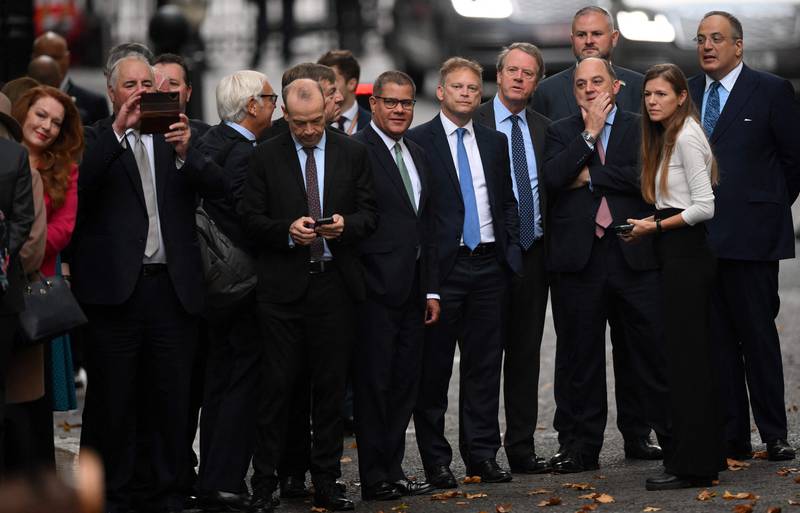 Conservative MPs gather to listen to Mr Johnson's speech. AFP