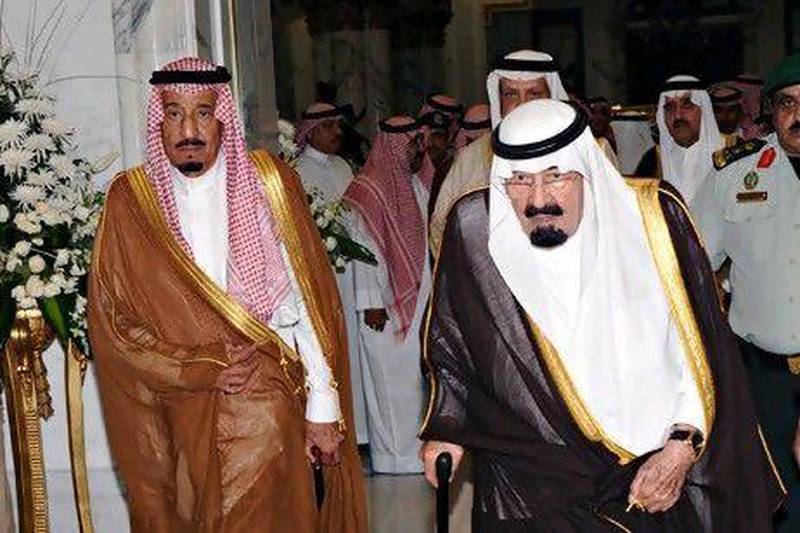 Saudi Arabia's King Abdullah (R) and Prince Salman arrive in Mecca to attend the funeral of Crown Prince Nayef.
