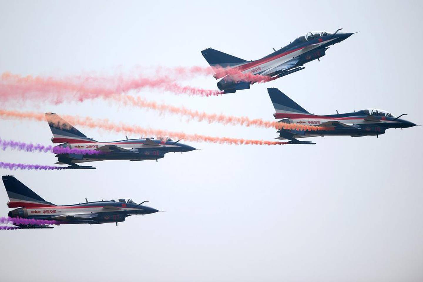 J-10 fighter jets of the Bayi Aerobatic Team perform at an airshow in 2014. AFP