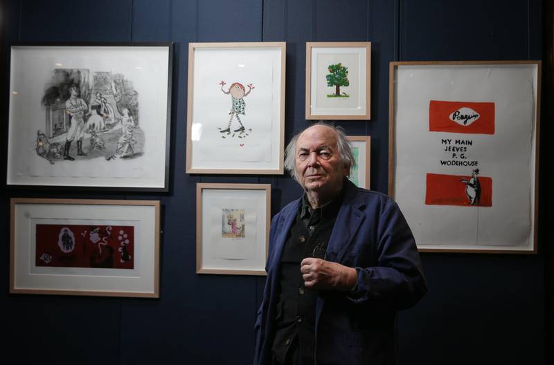 British illustrator and artist Quentin Blake poses with some of his work at Sotheby's action house in London on December 7, 2017 during a exhibition to promote the “First Editions Re-Covered” auction sale to benefit Quentin Blake’s Charity, House of Illustration.

The auction features 33 rare first editions of some of the world’s best-loved books each with a newly-designed cover created and donated by leading contemporary artists, illustrators, political cartoonists, fashion designers, actors, directors and authors.
 / AFP PHOTO / Daniel LEAL-OLIVAS / RESTRICTED TO EDITORIAL USE - MANDATORY MENTION OF THE ARTIST UPON PUBLICATION - TO ILLUSTRATE THE EVENT AS SPECIFIED IN THE CAPTION