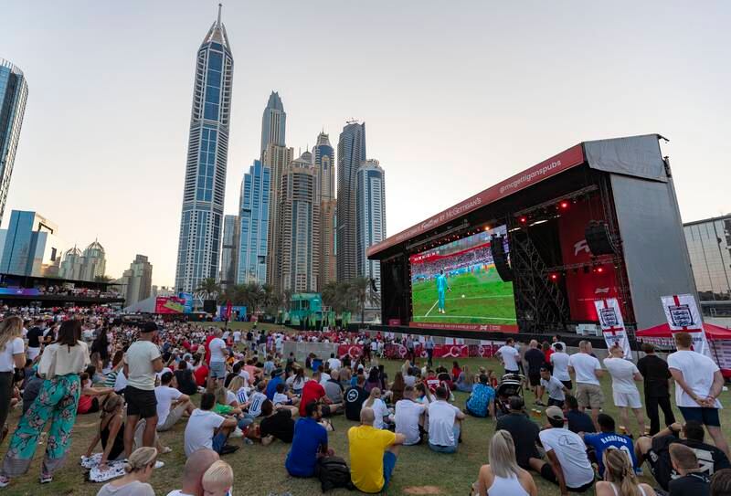 England and Iran fans at the Dubai Media City fanzone for World Cup. Media City, Dubai. Chris Whiteoak / The National