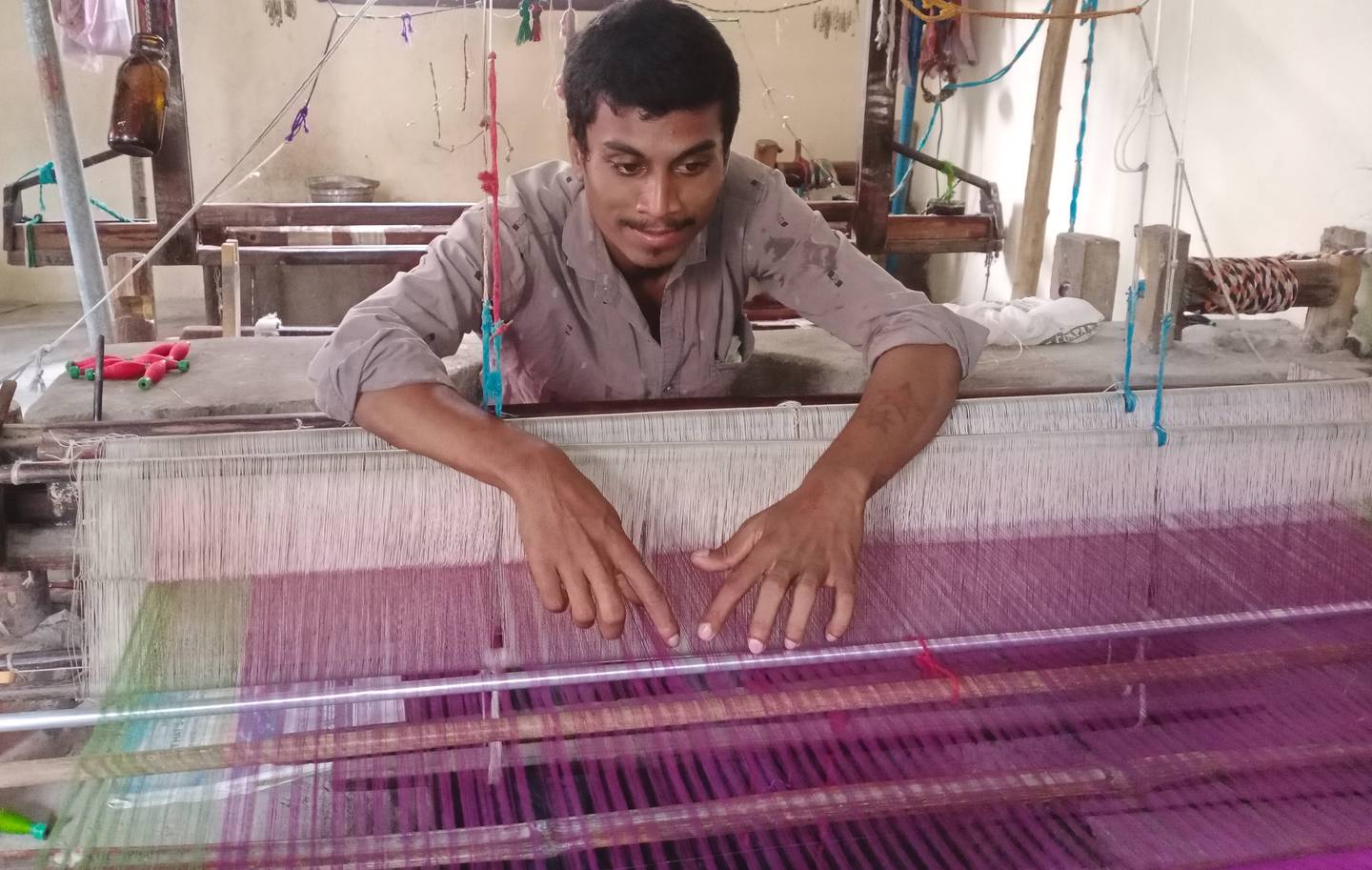 Operating a hand loom is an exacting process
