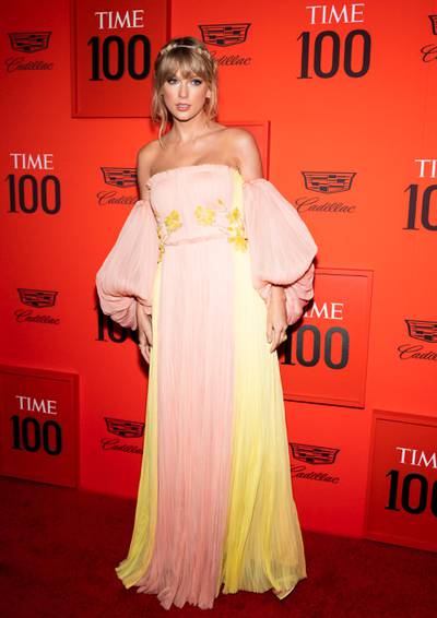 epa07524269 US singer Taylor Swift arrives for the annual Time 100 Gala at the Frederick P. Rose Hall at the Lincoln Center in New York, New York, USA, 23 April 2019. Yellow and pink floral embellished gown by J. Mendel. The annual event coincides with Time Magazine's annual list of the 100 most influential people in the world.  EPA-EFE/JUSTIN LANE