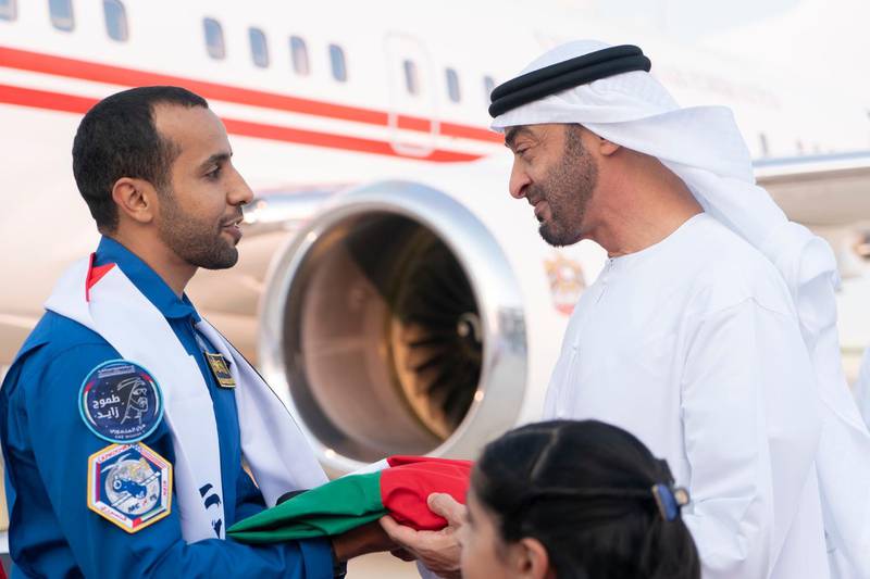 Sheikh Mohamed bin Zayed, Crown Prince of Abu Dhabi and Deputy Supreme Commander of the UAE Armed Forces, welcomes Hazza Al Mansouri to Abu Dhabi. Wam