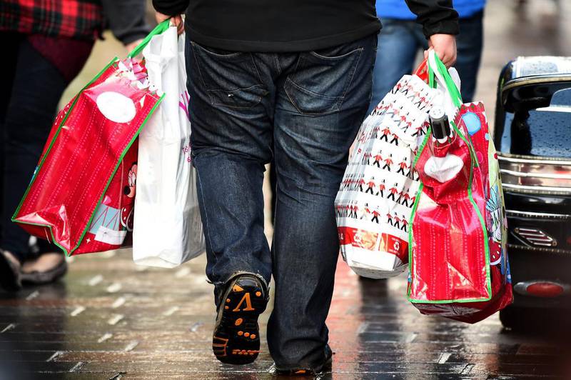 Shoppers look for Christmas gifts on the high street on December 19, 2014 in Glasgow, Scotland. With less than a week until Christmas, traditional high street retailers already under pressure from online shopping, will be hoping that the retail sales boost generated by Black Friday will continue. Jeff J Mitchell / Getty Images