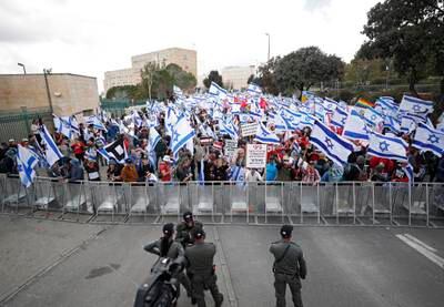 Protesters gather outside the Knesset as part of mass protests in Jerusalem. EPA