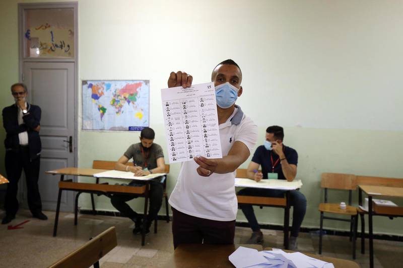 Election officials count ballots after the closing of stations in the legislative elections in Algiers, Algeria. EPA