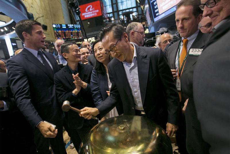 Joseph Tsai, vice chairman and co-founder of Alibaba, rings a ceremonial bell at the New York Stock Exchange to celebrate the company’s initial public offering. Brendan McDermid / Reuters