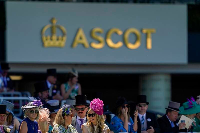Race-goers wait for the royal procession. Getty Images