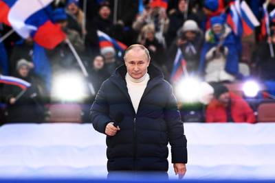 Russian President Vladimir Putin addresses crowds at a concert in Moscow to mark the eighth anniversary of the annexation of Crimea. AP