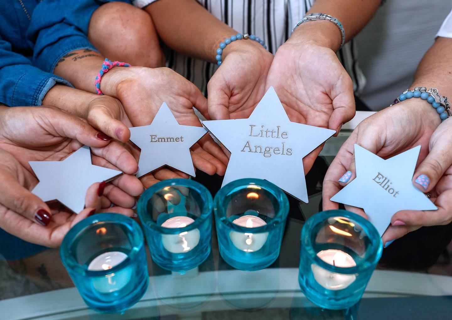 Dubhai, U.A.E., October 10, 2016.   A group of mums is meeting to discuss wooden stars and candles that will be used in ceremonies next week to help families come to terms with losing infants and help them remember babies lost due to miscarriages, stillbirths or due to sudden infant death syndrome.Victor Besa / The NationalSection:  NAReporter:  Ramola Talwar