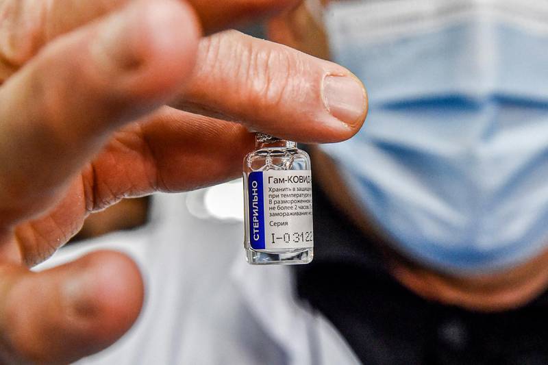 A vial of Russia's Sputnik V vaccine for Covid-19 is shown before being administered for the first time to people at a clinic in the city of Blida in Algeria. AFP