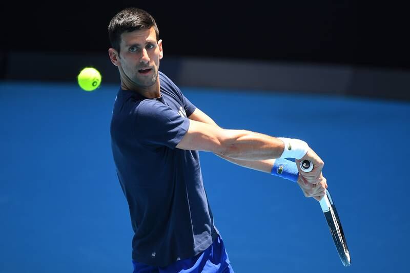 Novak Djokovic hits a return. EPA