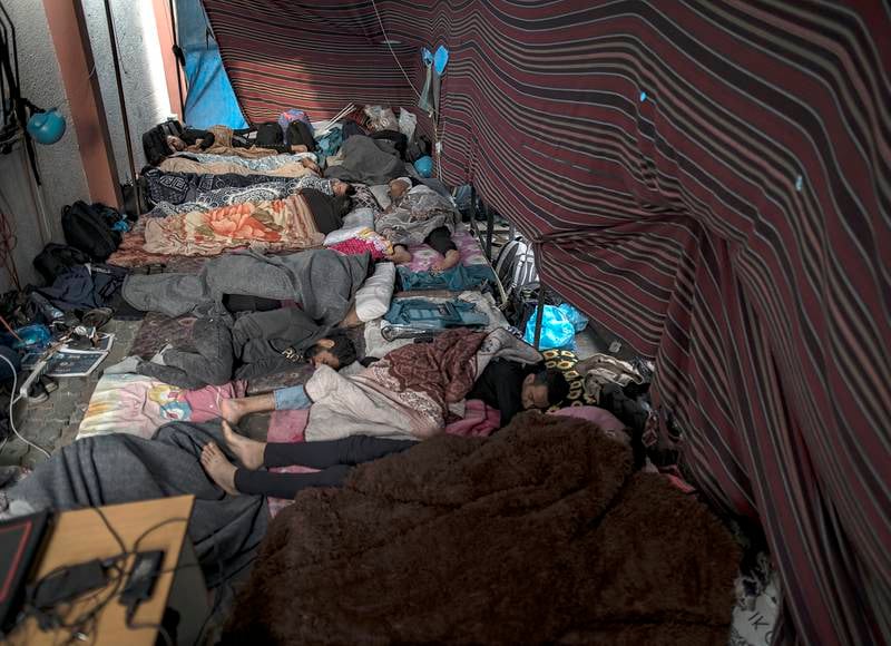 Displaced Palestinians sleeping on the floor at Nasser Hospital in Khan Younis, the southern Gaza Strip, on Tuesday. EPA