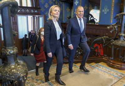 Russian Foreign Minister Sergey Lavrov and Liz Truss arrive for talks in Moscow in February. AP