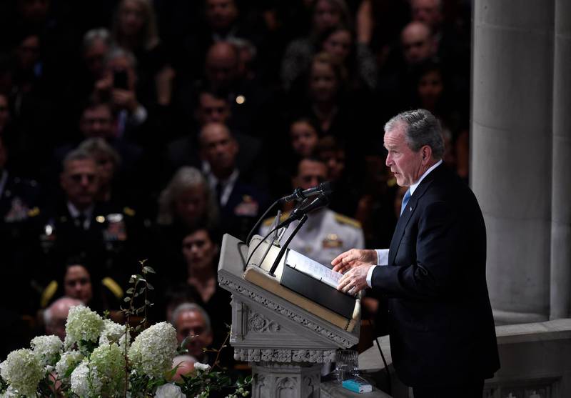Former US President George W Bush speaks during a memorial service for John McCain. AFP