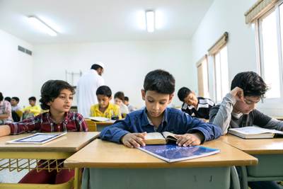 DUBAI, UNITED ARAB EMIRATES, March 20, 2015. Students at Level 5 classroom in Al Manar Quran Study Center. Level 5 is the highest in the center, where excelling students from all age groups are brought together.  Photo: Reem Mohammed / The National   *** Local Caption ***  RM_20150320_QURAN_012.jpg