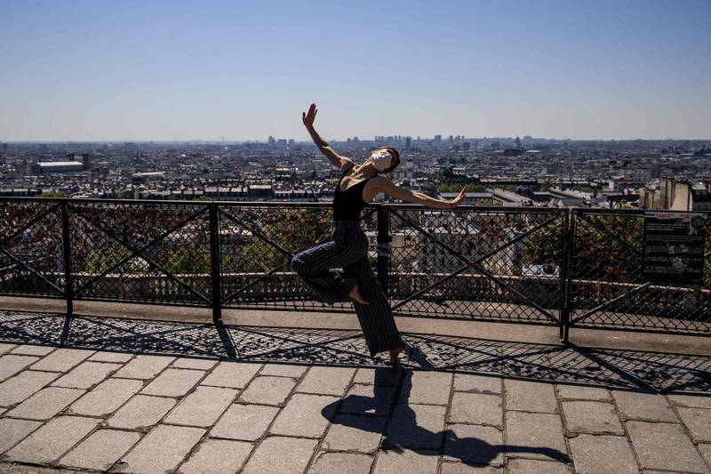 Syrian dancer and choreographer Yara al-Hasbani performs a dance in Montmatre, Paris on the 37th day of a strict lockdown in France to stop the spread of COVID-19.  AFP