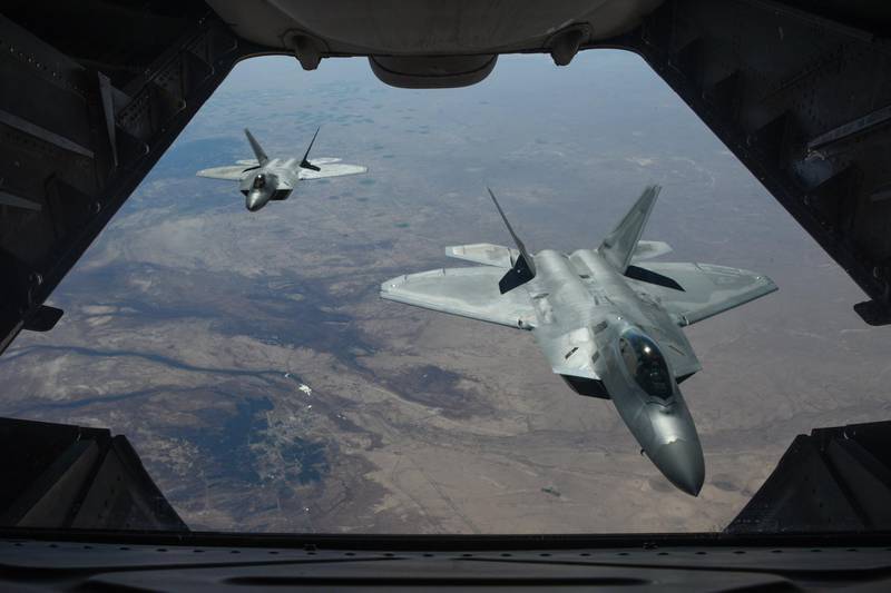 epa06505045 A handout photo made available by the US Department of Defense shows two US Air Force F-22 Raptors flying above Syria in support of Operation Inherent Resolve, 02 February 2018 (issued 08 February 2018). According to the US military on 07 February, an airstrike carried out by US forces has killed more than 100 fighters loyal to Syrian President Bashar al-Assad. An US military official said the airstrikes were an act of self-defense after troops allegedly loyal to the Syrian President attacked the US-backed anti-IS coalition.  EPA/COLTON ELLIOTT / US AIR FORCE HANDOUT  HANDOUT EDITORIAL USE ONLY/NO SALES