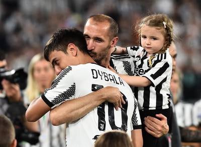 Departing Juventus duo Giorgio Chiellini and Paulo Dybala embrace during a tribute ceremony following the 2-2 draw against Lazio at the Juventus Stadium in Turin.