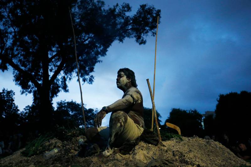 Jida Gulpilil, a Yorta Yorta Dhudhuroa man, performs a smoking ceremony at a dawn service on Australia Day.  Getty