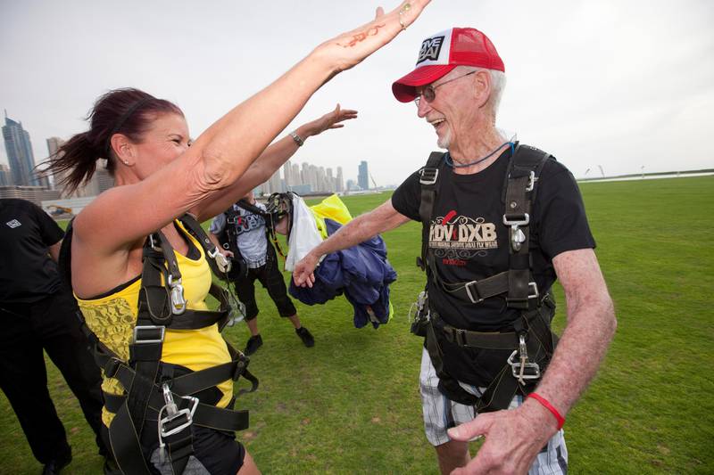 Dubai, United Arab Emirates, Apr 10, 2013 -  Dick Corbit, is congratulated by his daughter Lynn after his parachute jump at skydive. Corbit is the oldest jumper to skydive at skydive Dubai and today is his 86 birthay. ( Jaime Puebla / The National Newspaper ) 