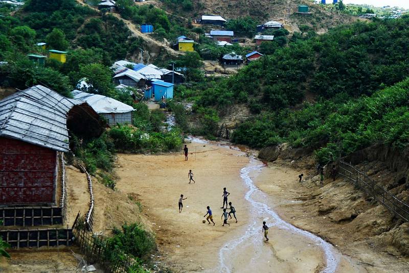Rohingya refugee children play football in Kutupalong refugee camp. AFP