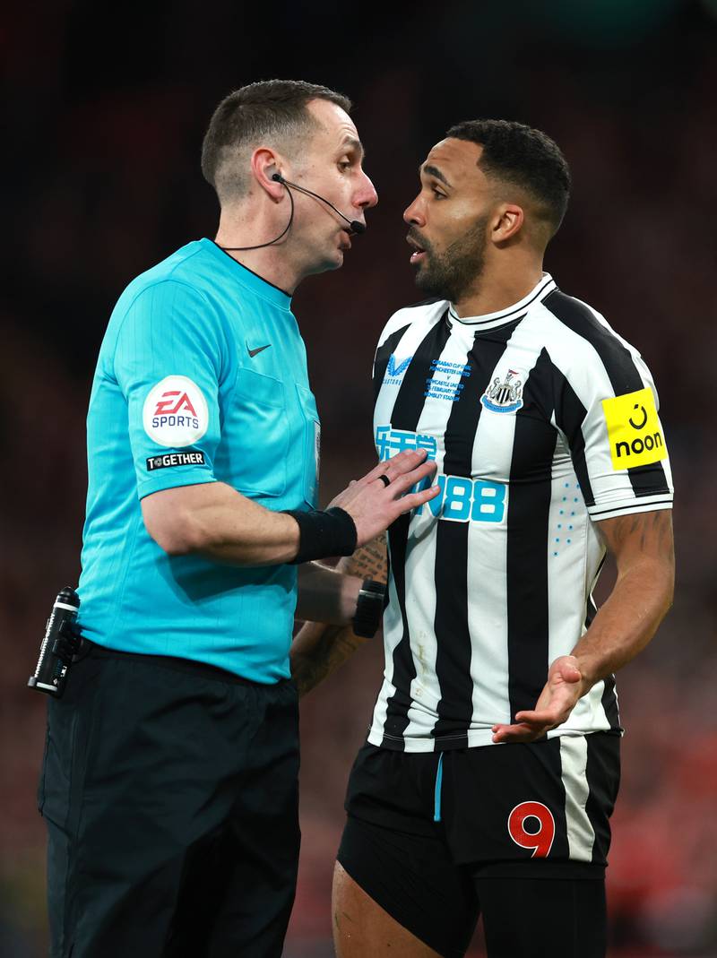Callum Wilson of Newcastle United is spoken to by referee David Coote. Getty