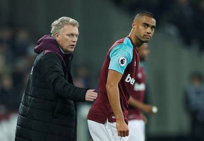 Soccer Football - Premier League - West Ham United vs Leicester City - London Stadium, London, Britain - November 24, 2017   West Ham United manager David Moyes and Winston Reid             REUTERS/Eddie Keogh  EDITORIAL USE ONLY. No use with unauthorized audio, video, data, fixture lists, club/league logos or "live" services. Online in-match use limited to 75 images, no video emulation. No use in betting, games or single club/league/player publications. Please contact your account representative for further details.