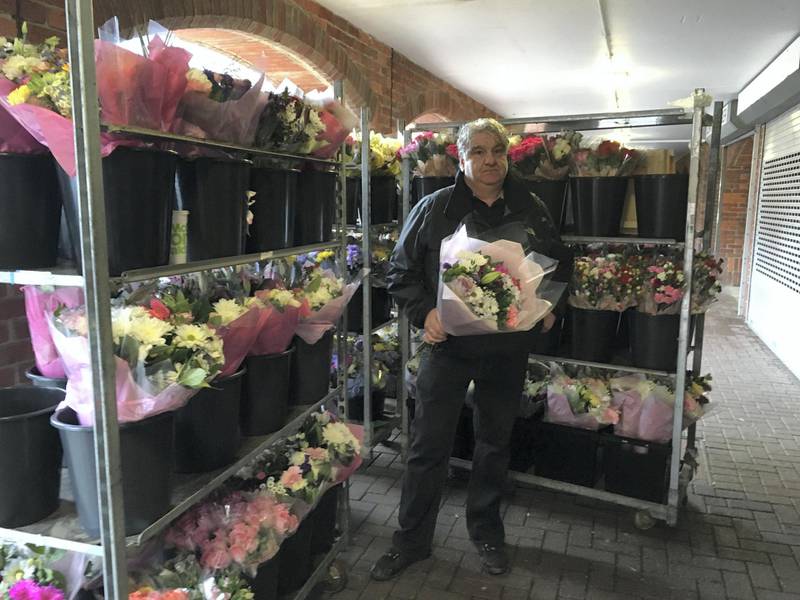 Mark Fitzpatrick with his unsold flowers in Salisbury. Photo by Paul Peachey