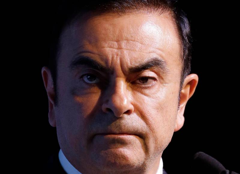 FILE - In this April 2, 2014, file photo, Carlos Ghosn, the then-Renault-Nissan Alliance Chairman and CEO, listens to reporter's question during a press conference about Renault Samsung Motors' global vision plan in Seoul, South Korea. Major Japanese business daily Nikkei is reporting Nissanâ€™s former Chairman Carlos Ghosn has reiterated his innocence, saying the payments to a Saudi businessman were legitimate and Nissan people knew about the transaction. Ghosn has been charged with breach of trust in the payments, and with falsifying financial reports in underreporting compensation from Nissan. (AP Photo/Lee Jin-man, File)