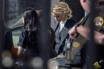 US actress Amber Heard leaves the Fairfax County Circuit Court in Virginia on April 11.  AFP