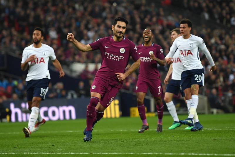 LONDON, ENGLAND - APRIL 14: Ilkay Gundogan of Manchester City celebrates after scoring his sides second goal during the Premier League match between Tottenham Hotspur and Manchester City at Wembley Stadium on April 14, 2018 in London, England.  (Photo by Shaun Botterill/Getty Images)