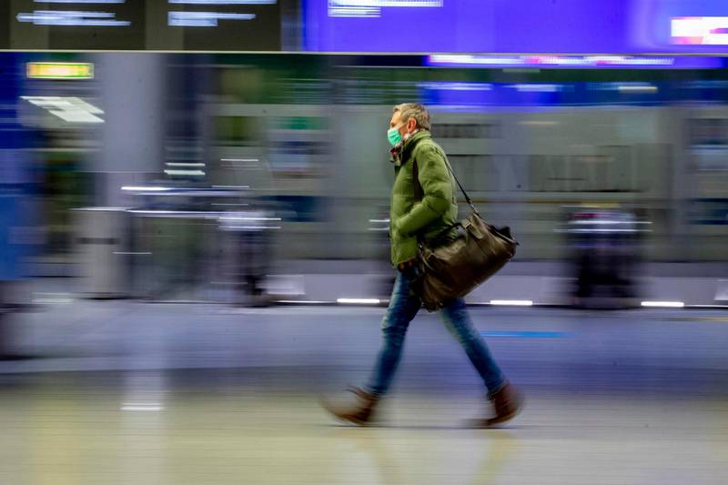 A passenger walks through a terminal at the international airport in Frankfurt. The German government has increased the border controls for some flights. AP Photo