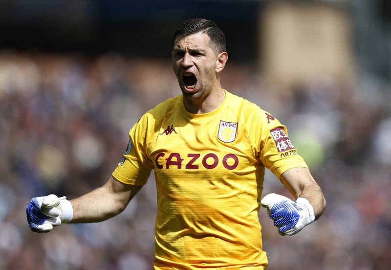 Aston Villa goalkeeper Emiliano Martinez celebrates after Danny Ings' goal. Reuters