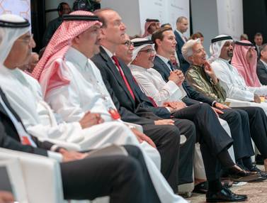 White House senior adviser Jared Kushner, fourth left, and Christine Lagarade, third left, managing director and chairman of the International Monetary Fund, attending the Peace to Prosperity conference in Manama, Bahrain. EPA