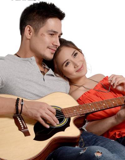 Sarah Geronimo, right, returns to the big screen in The Breakup Playlist, in which she stars with Piolo Pascual, left. Courtesy Star Cinema