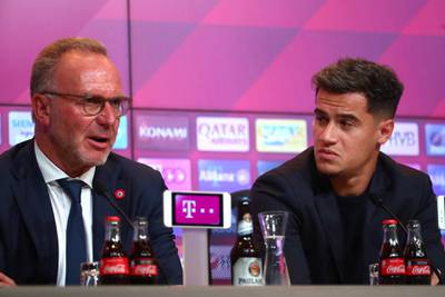 Bayern Munich CEO Karl-Heinz Rummenigge and Philippe Coutinho address reporters. Reuters