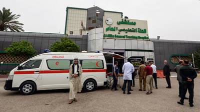 An ambulance that transported members of the Hashed Al Shaabi paramilitaries, injured in an area targeted by US military air strikes, arrives at Hilla General Teaching Hospital. AFP