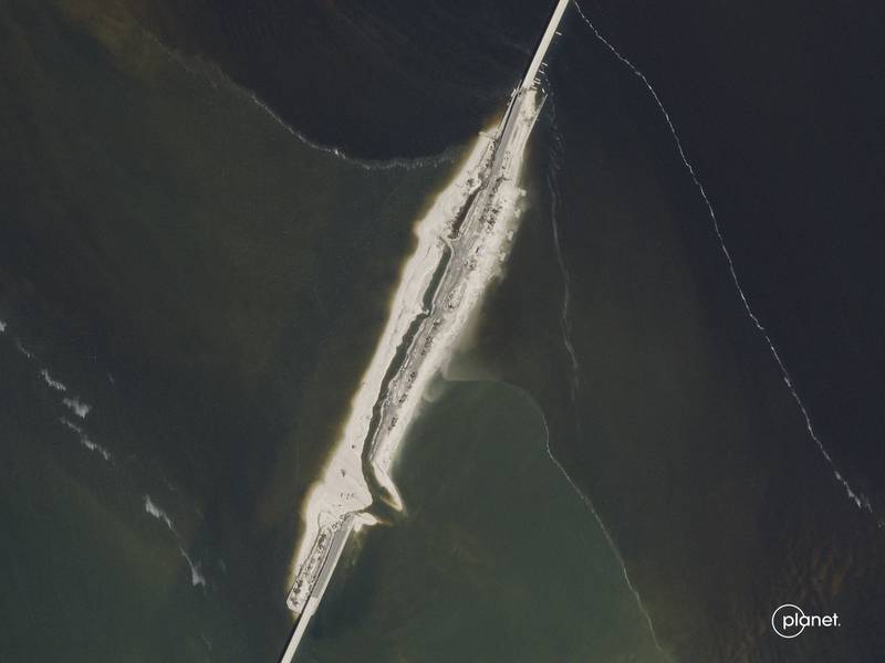 A satellite view taken by imaging company Planet Labs shows damage inflicted on an island in the Sanibel Causeway in Florida by Hurricane Ian. AP