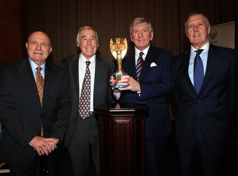 From leftL Former England and World Cup winning players George Cohen, Gordon Banks, Martin Peters and Sir Geoff Hurst with the Jules Rimet trophy. PA
