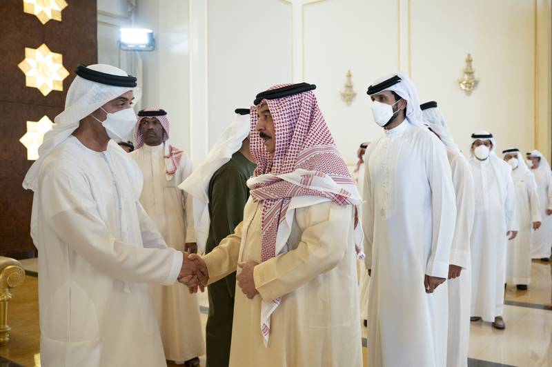 King Hamad of Bahrain, front right, and Sheikh Nasser bin Hamad, fifth from left, speak with Sheikh Hazza bin Zayed, Vice Chairman of Abu Dhabi Executive Council, left. Abdulla Al Neyadi for the Ministry of Presidential Affairs 
