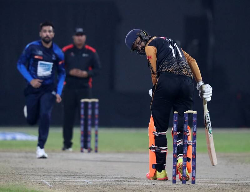 Mohammed Amir bowls for Interglobe Marine during the game against Bukhatir XI.