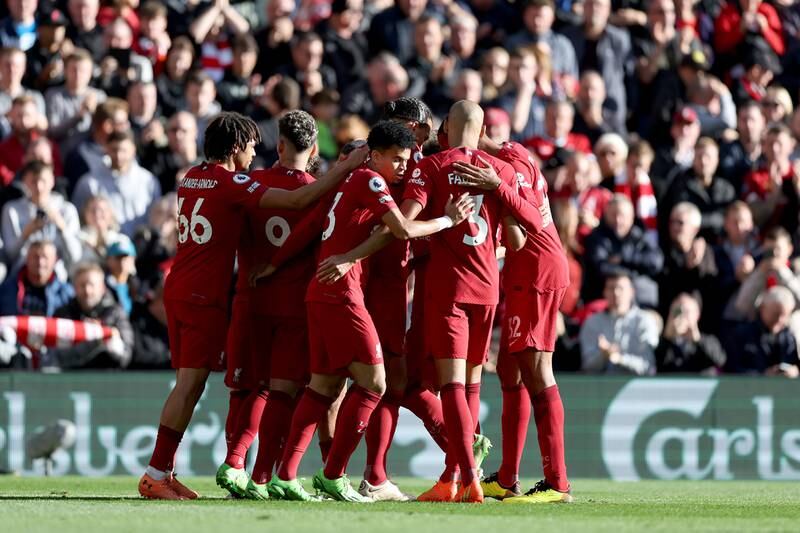 Liverpool celebrate their third goal. Getty