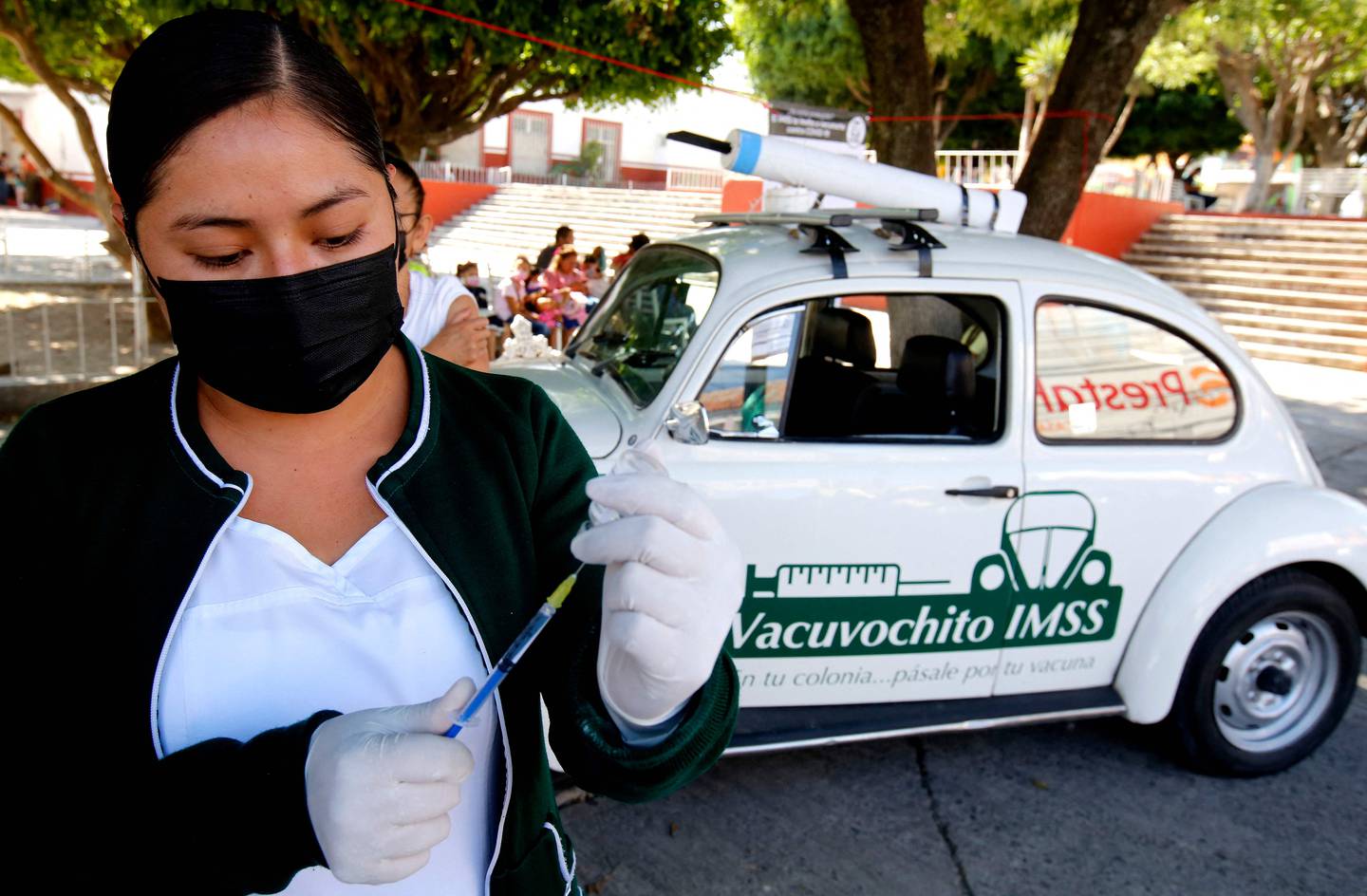 A nurse from the Mexican Social Security Institute prepares a dose of AstraZeneca's Covid-19 vaccine during a campaign to reach out to people in low-income neighbourhoods, in Guadalajara. AFP