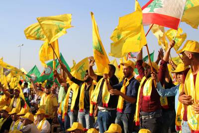 Supporters of the Lebanese Shiite movement Hezbollah attend on August 31, 2017 a rally in Baalbek to celebrate the return of its fighters after fighting a week-long offensive against the Islamic State (IS) group on Syria's side of the Lebanese border. 
The head of Lebanese Shiite movement Hezbollah, who has lived in hiding for a decade, said he had travelled to Damascus to seek the Syrian president's approval for a jihadist evacuation deal, where hundreds of Islamic State group fighters and civilians were evacuated from the border region between Lebanon and Syria under a ceasefire deal and headed toward eastern Syria near the Iraqi border. The truce deal was negotiated between IS and Hezbollah, which has intervened in Syria's six-year war to prop up Assad's government.
 / AFP PHOTO / STRINGER