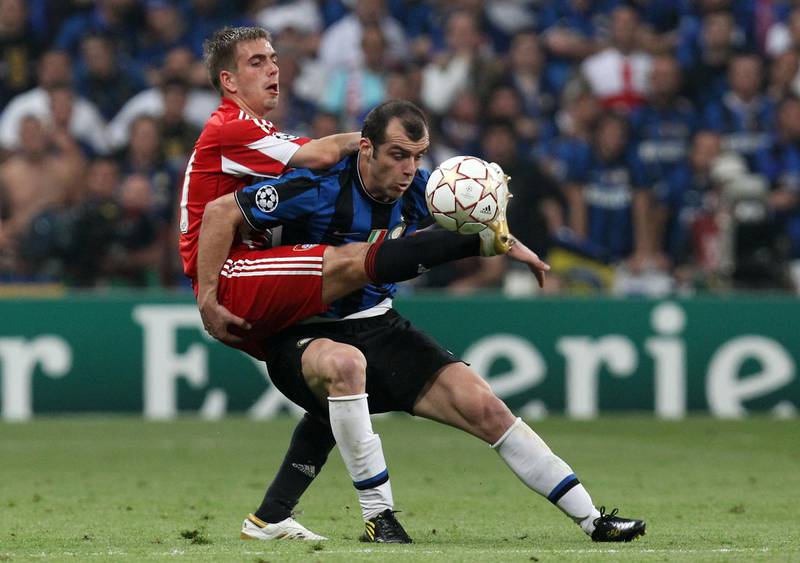 MADRID, SPAIN - MAY 22:  Goran Pandev of Inter Milan  challenges Philipp Lahm of Bayern Muenchen during the UEFA Champions League Final match between FC Bayern Muenchen and Inter Milan at the Estadio Santiago Bernabeu on May 22, 2010 in Madrid, Spain.  (Photo by Alex Grimm/Bongarts/Getty Images)