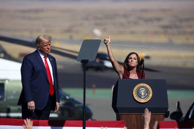 PRESCOTT, AZ - OCTOBER 19: U.S. President Donald Trump watches as Senator Martha McSally (R-AZ) speaks at a Make America Great Again campaign rally on October 19, 2020 in Prescott, Arizona. With almost two weeks to go before the November election, President Trump is back on the campaign trail with multiple daily events as he continues to campaign against Democratic presidential nominee Joe Biden.   Caitlin O'Hara/Getty Images/AFP
== FOR NEWSPAPERS, INTERNET, TELCOS & TELEVISION USE ONLY ==
