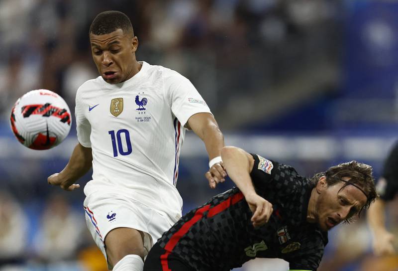 France's Kylian Mbappe in action with Croatia's Luka Modric. Reuters