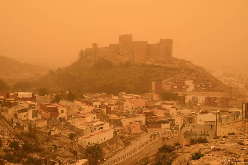 The Almeria fortress, in southeastern Spain, covered in orange sand. EPA
